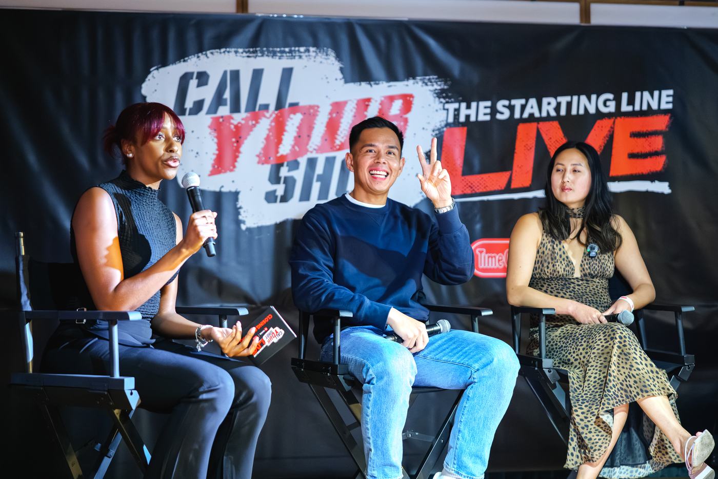 Call Your Shot panel on stage at Time Out Market New York, three speakers in front of the event banner